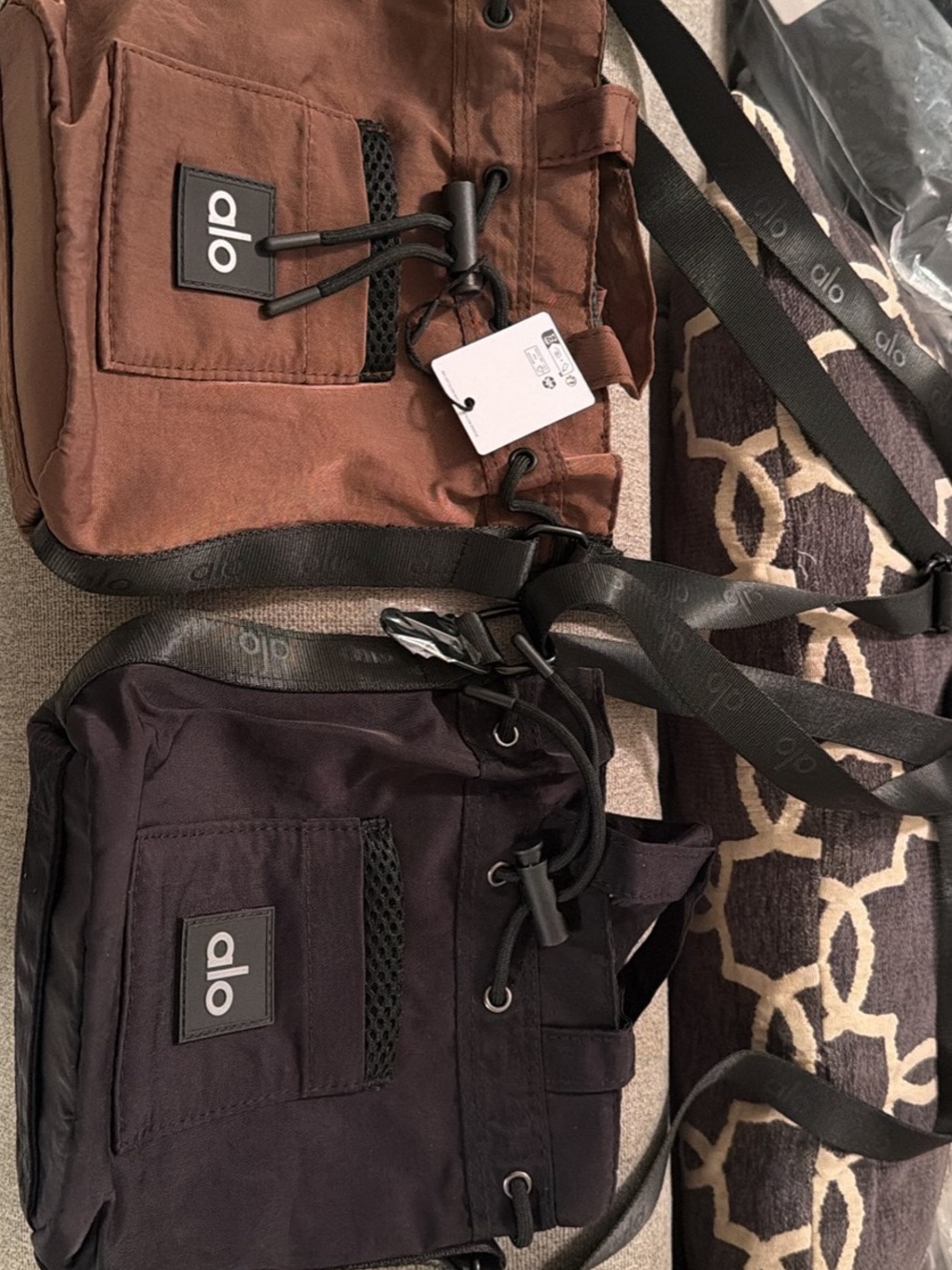 ALO Yoga Men’s Messenger Bag in Black and Brown